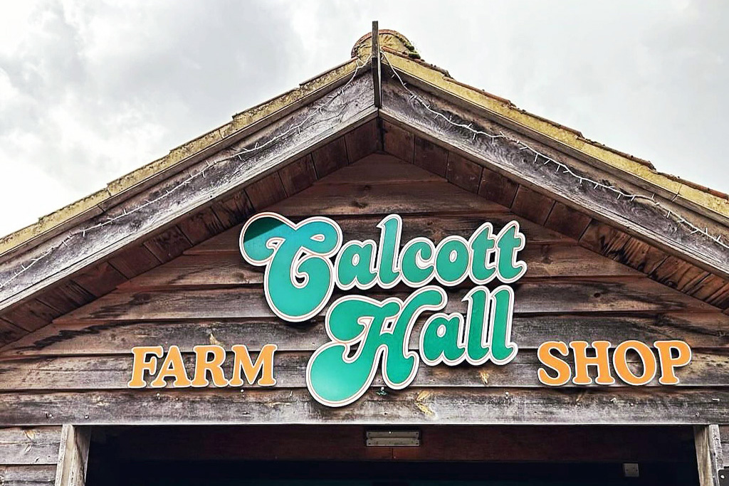 Entrance and signage of Calcott Hall Farm Shop.