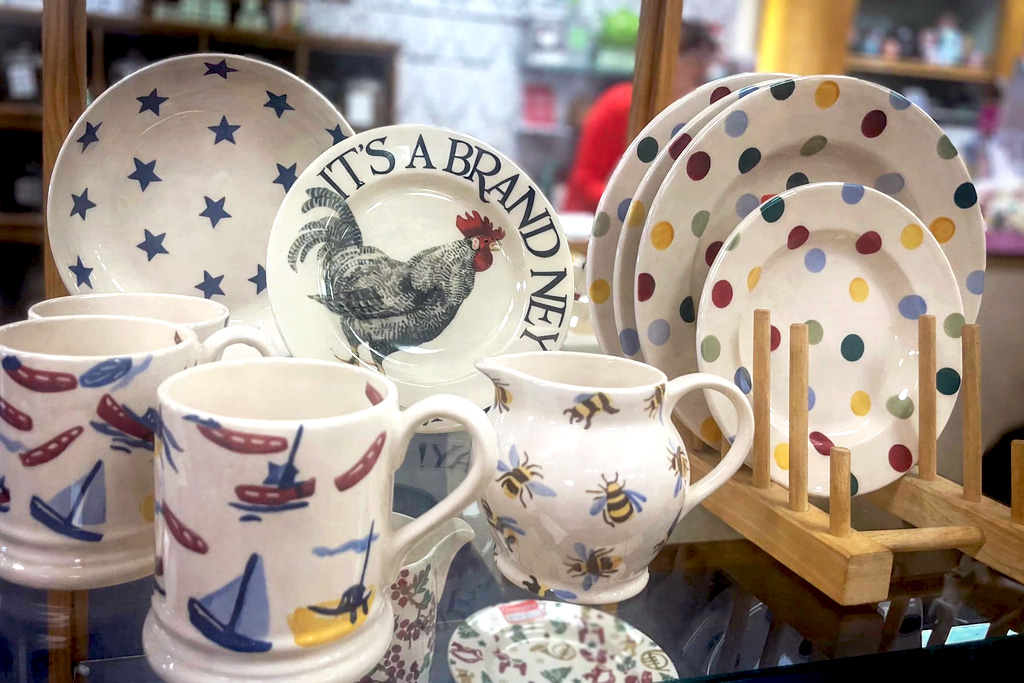 patterned plates and mugs with polka dots stars and animal designs