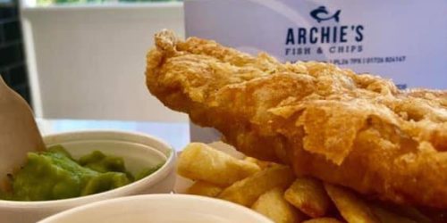 Freshly cooked fish and chips with mushy peas and tartare sauce at Archie’s Fish and Chips