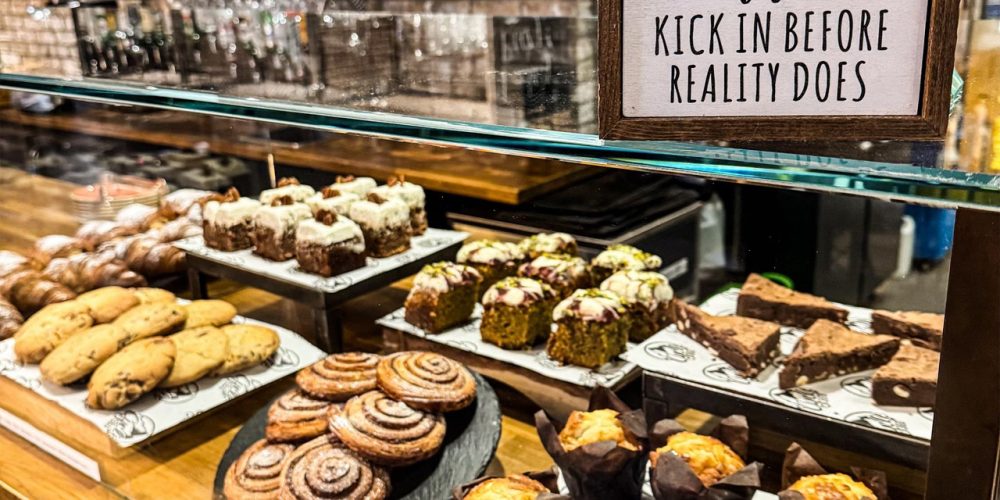 Cake and pastry display at Café 360 inside Cycle 360