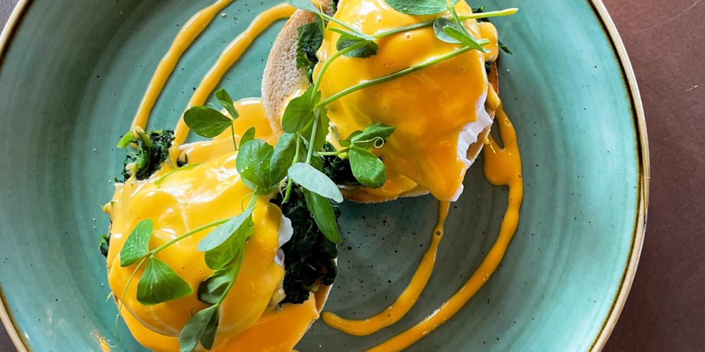 Eggs Benedict with poached eggs and hollandaise sauce served at Café 360 on the Isle of Man