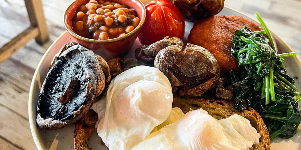 Full breakfast with poached eggs, sourdough toast and vegetables at Café 360 on the Isle of Man