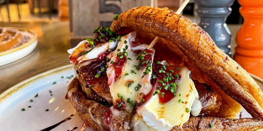 Gourmet toasted sandwich with melted cheese, cured meat and balsamic glaze served at Café 360 on the Isle of Man