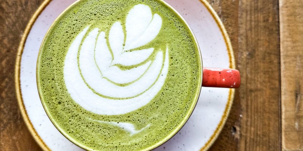 Matcha latte with leaf latte art served at Café 360 on the Isle of Man