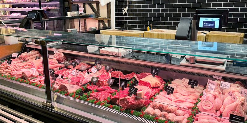 Fresh meat and poultry displayed at the Calcott Hall Farm Shop butchery counter.
