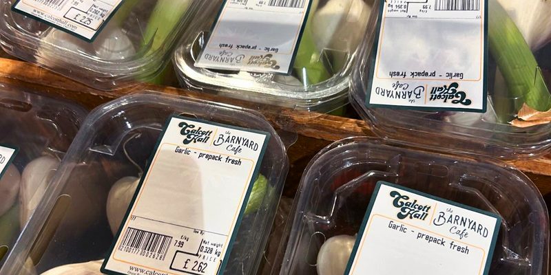 Pre-packed fresh garlic labelled for sale at Calcott Hall Farm Shop.