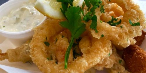 Crispy squid rings served with tartare sauce and lemon at The Fishermen’s Chippy
