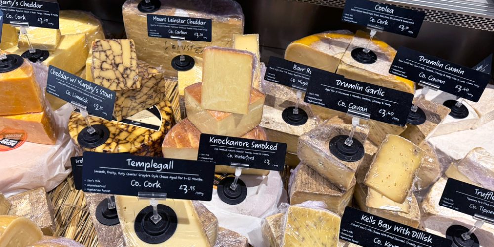 Selection of artisan Irish cheeses displayed at the Indie Füde deli and cheesemonger in Belfast.