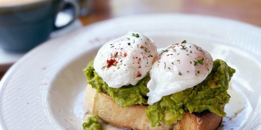 Poached eggs and avocado on toast served in Kilnford Farm Shop café