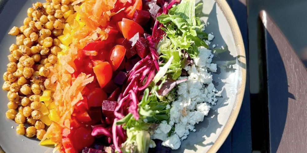 Fresh salad bowl with vegetables and chickpeas served at Kilnford Farm Shop café