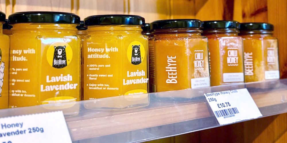 Local honey jars displayed on shelves at Kilnford Farm Shop