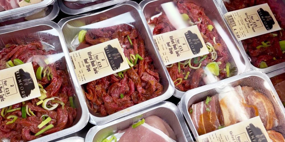 Prepared meat packs ready for sale at Kilnford Farm Shop butcher counter