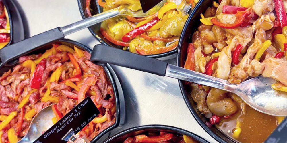Prepared stir fry meals on display at Kilnford Farm Shop food counter