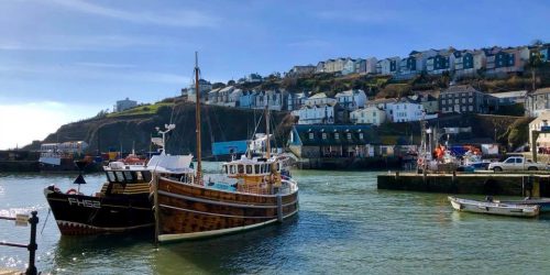Fishing boats moored in Mevagissey harbour on the Cornish coast