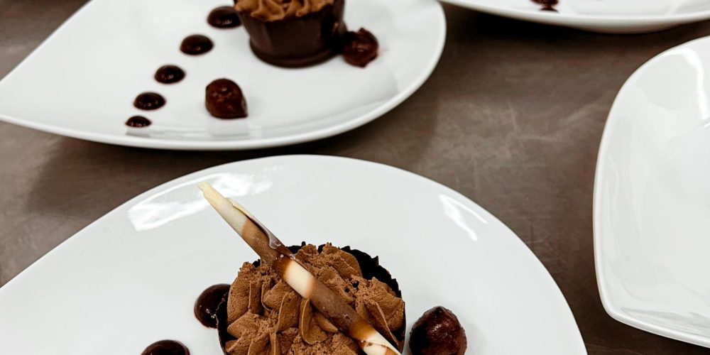 Plated chocolate dessert prepared for a private event at Woodbourne House on the Isle of Man.