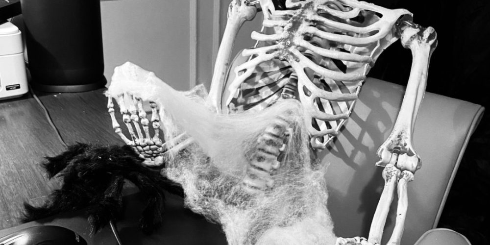 Halloween-themed event décor with skeleton display at Woodbourne House, an Isle of Man wedding and events venue.