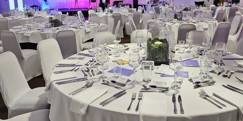 Wedding reception tables set for a formal event at Woodbourne House on the Isle of Man.