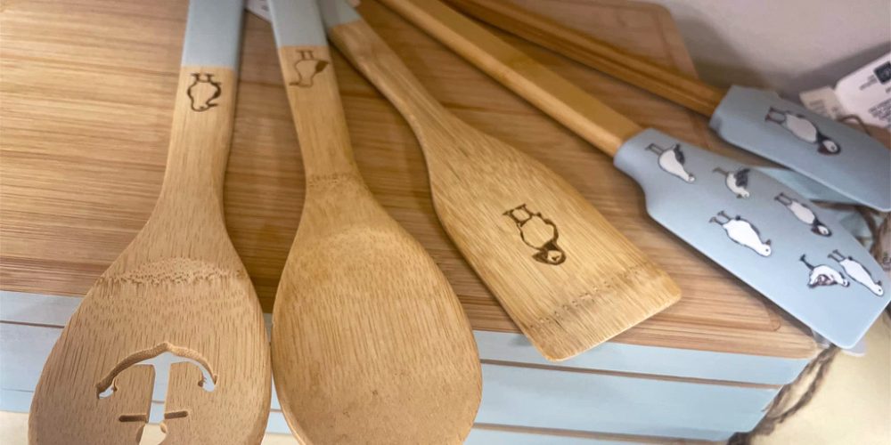 bamboo kitchen utensils with animal designs on handles