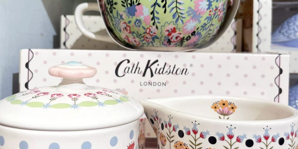 Cath Kidston kitchenware display with floral bowls, teapot and storage jars