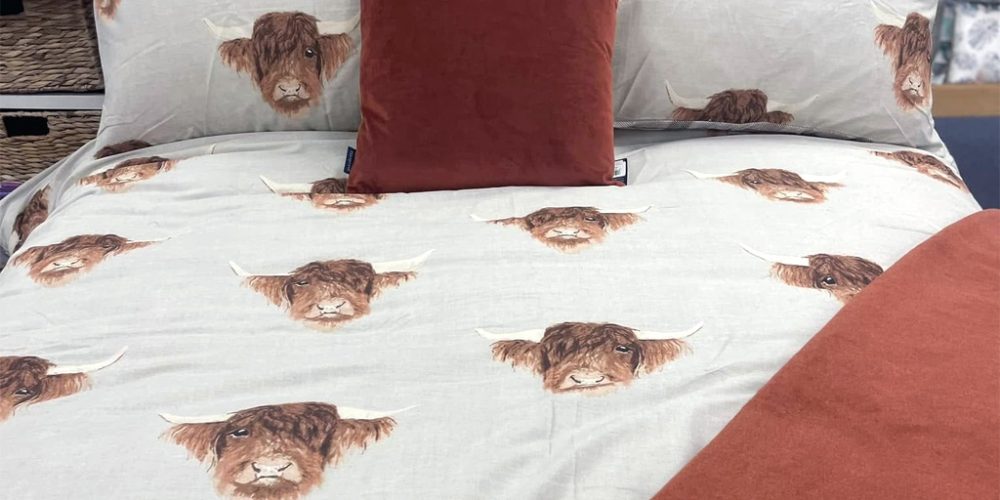 highland cow bedding set with matching pillows and cushion