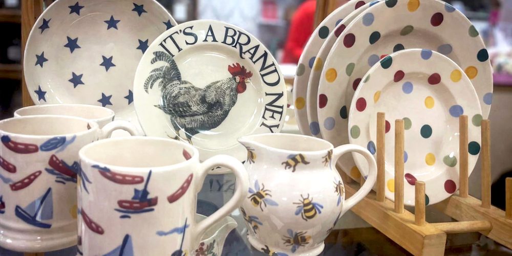 patterned plates and mugs with polka dots stars and animal designs